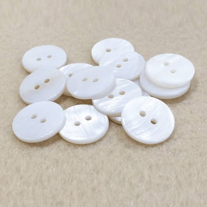 Badhan Balanbaalis Shell Button